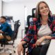 business woman working on desktop computer in modern open plan office